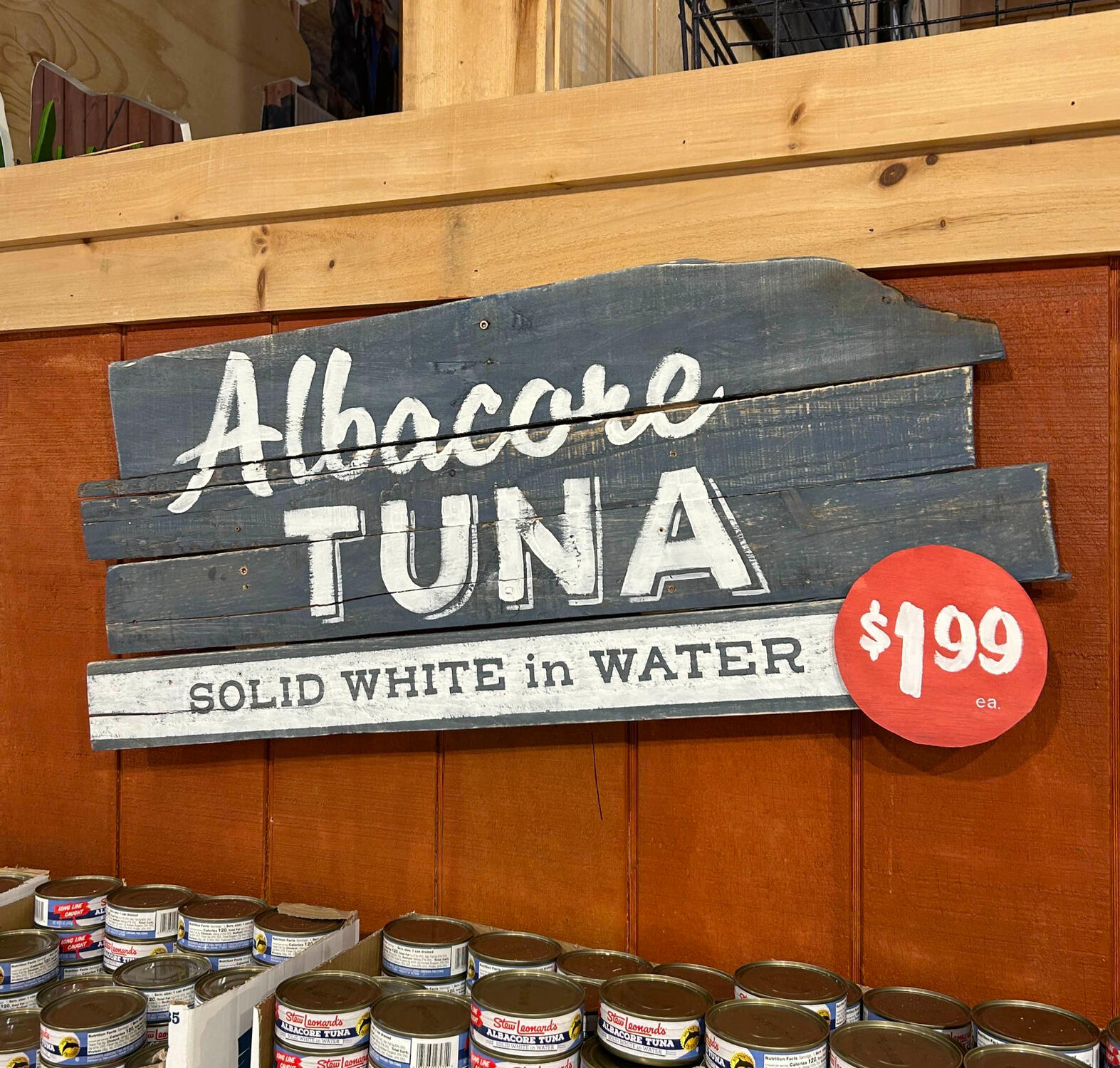 A hand-painted sign for Stew Leonard's grocery store.