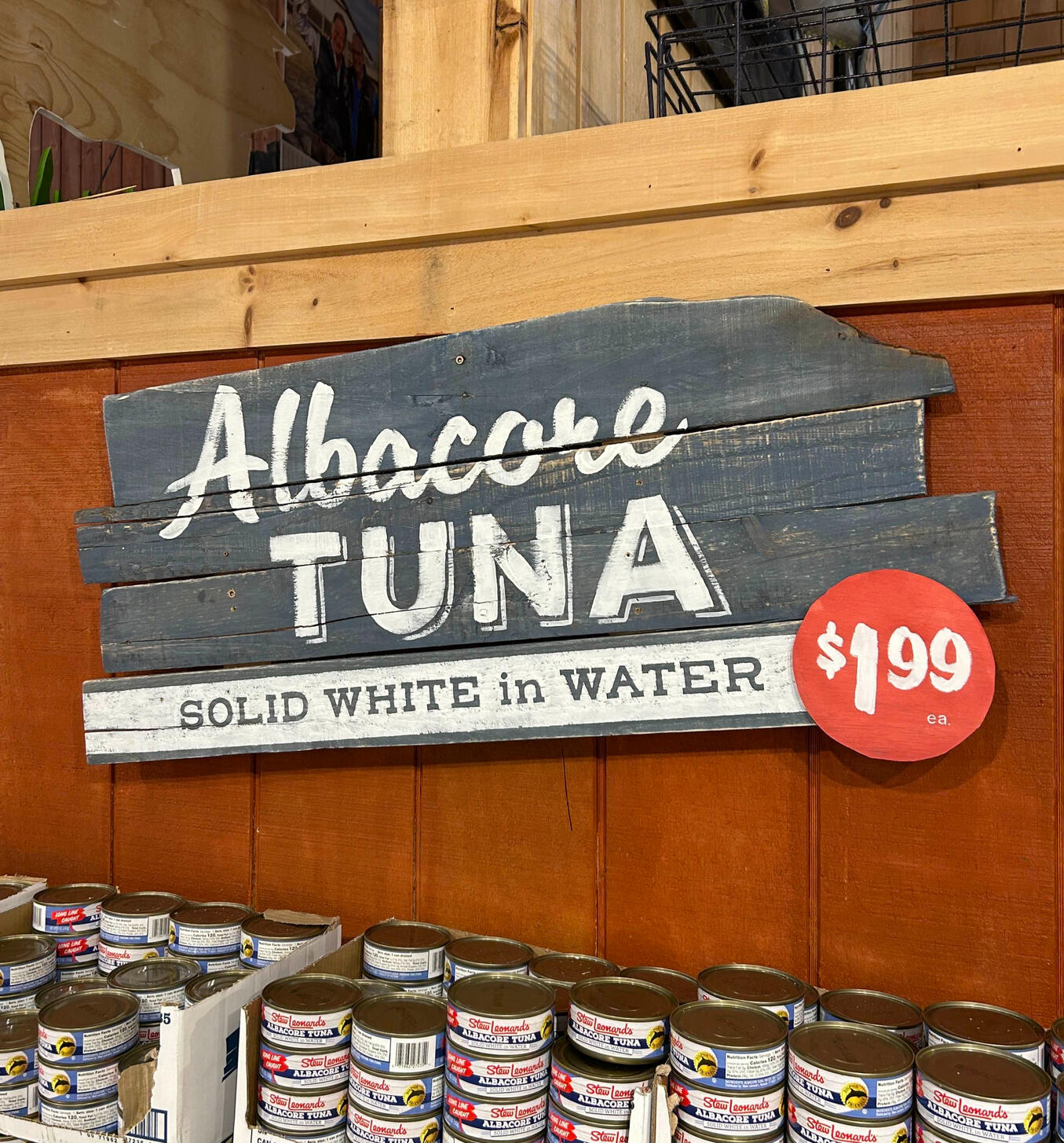 A hand-painted sign for Stew Leonard's grocery store.